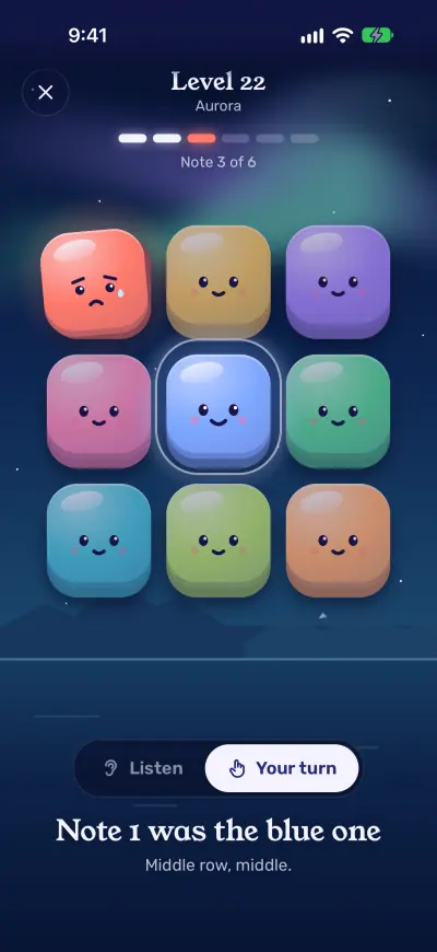 A slip on level 22: the tapped red toy looks worried and the blue toy in the middle is ringed in light, under the words Note 1 was the blue one